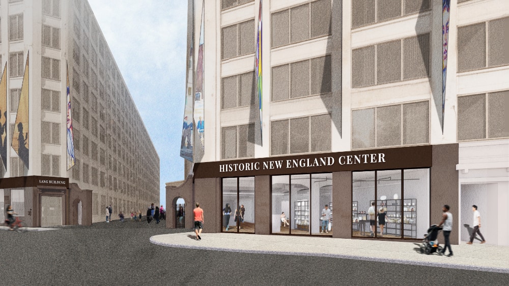 An artist rendering of the exterior of the Historic New England Center in Haverhill. People are inside the building, visible through the large windows, and there are pedestrians walking outside.