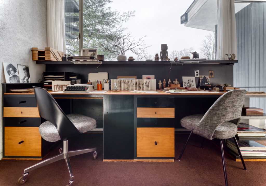 The study in Gropius House showing office chairs and multiple desks.