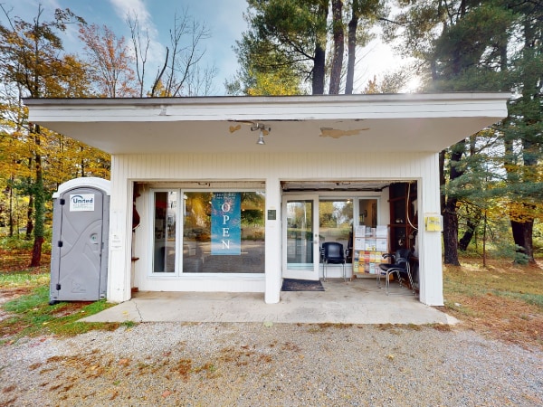 A photo of the outside of the garage at Gropius House, used for the visitor center.