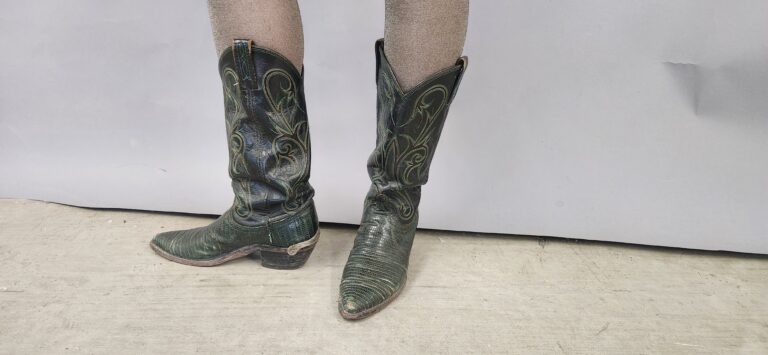 Cowboy boots with green lizard skin last.