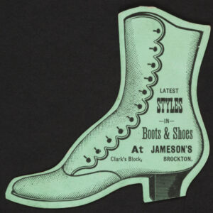 A green piece of cardstock with black ink in the shape of a heeled boot with many buttons. The boot is printed with details that emphasize the boot shape and text advertising Jameson's on Clark's Block in Brockton.