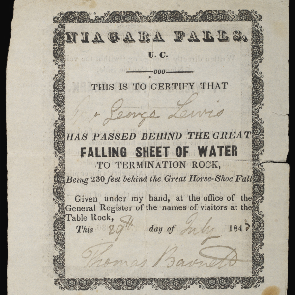A certificate certifying that George Lewis passed behind the waterfall at Niagara in 1846. The name of the certificate holder, date, and signature of the official, are all hand-written, while the rest of the certificate is a printed template.