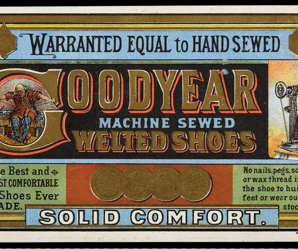 A horizontal, rectangular card reading “Warranted Equal to Hand Sewn, Goodyear Machine Sewed Welted Shoes” with images of a male shoe worker seated and sewing a shoe by hand on the left and another male shoe work standing and using a machine on the right. Below reads “The Best and Most Comfortable Shoes Ever Made, Solid Comfort, no nails, pegs, screws, or wax thread inside the shoe to hurt the feet or wear out the stocking” with images of four award metals.