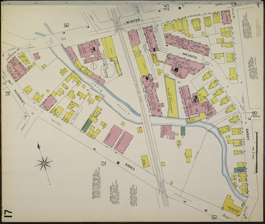 A map showing the triangular area between Essex Street at the bottom, Winter Street at the top, and Locke Street at the right. The railroad tracks divide the image at center, with many surrounding pink (brick) and yellow (wood) buildings visible. There is a void at the bottom right side where there are no buildings in 1906.