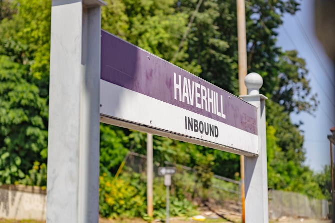 A purple and white sign for inbound transportation to Haverhill. There are two lines of text: Haverhill and Inbound.