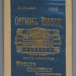A long blue silk ribbon with gold writing, gold embroidered horizontal borders at the top and bottom, and fringe of twisted gold thread at the bottom. The text proclaims that the ribbon is an “Official Ribbon issued by Authority of the World’s Columbian Exposition” and this particular ribbon was issued for “Premium Awarded Slippers exhibited by Woodman and Howes, Haverhill, Mass.”