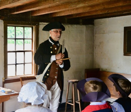 Man dressed as colonial schoolmaster
