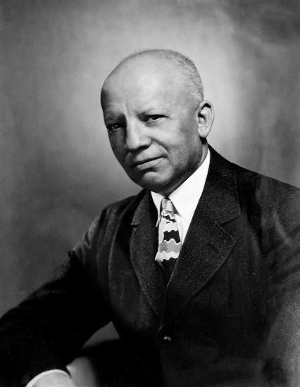 Photographic portrait of Carter G. Woodson.