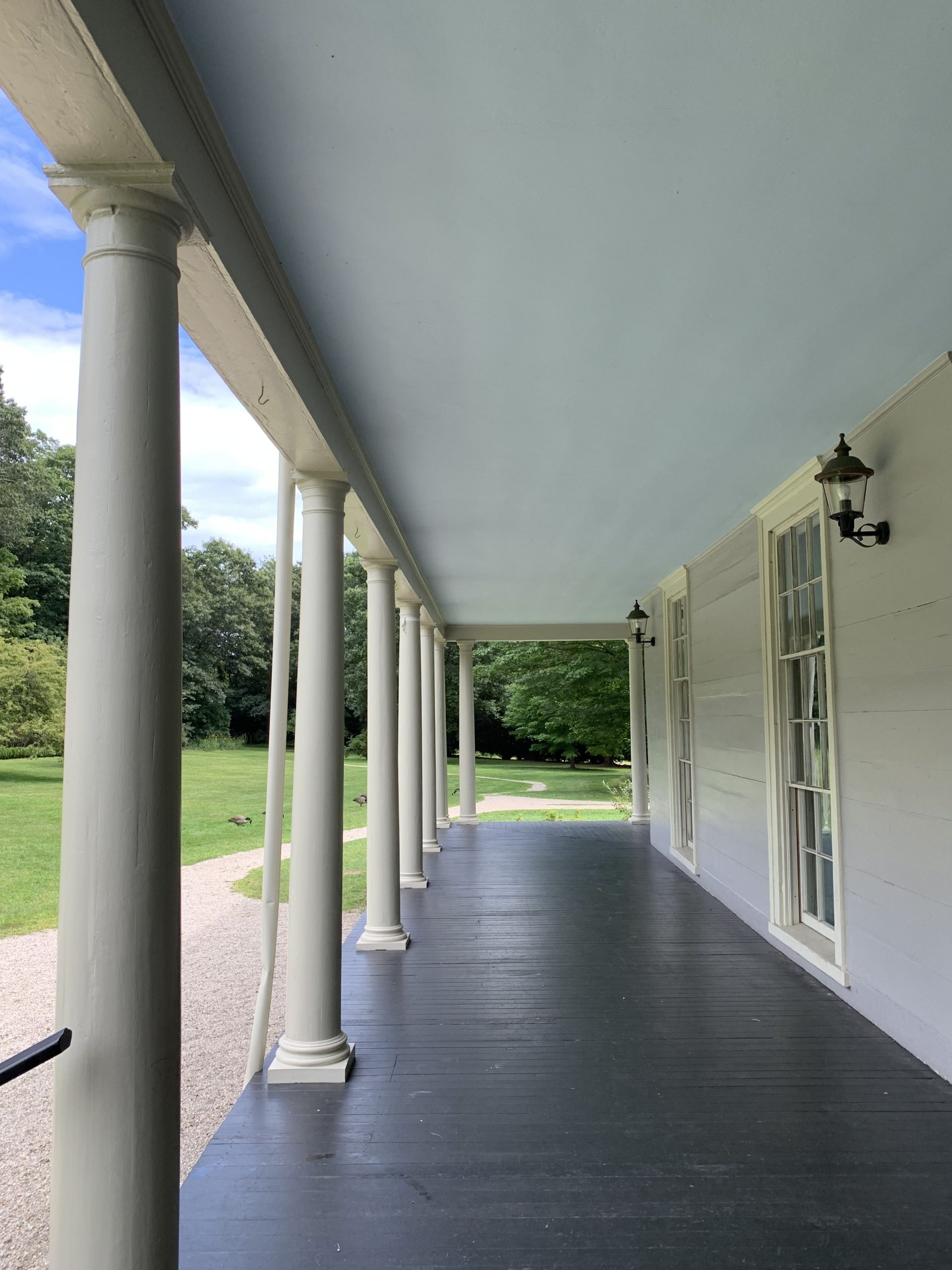A photo of the underside of the roof of the Lyman Estate's veranda. It is a light blue color.