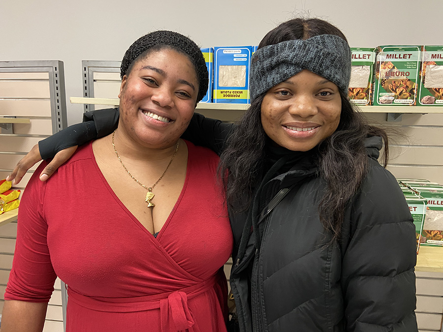 Twin sisters Fadhili and Faraja Achinda, customers, M. Square Vermont, Winooski