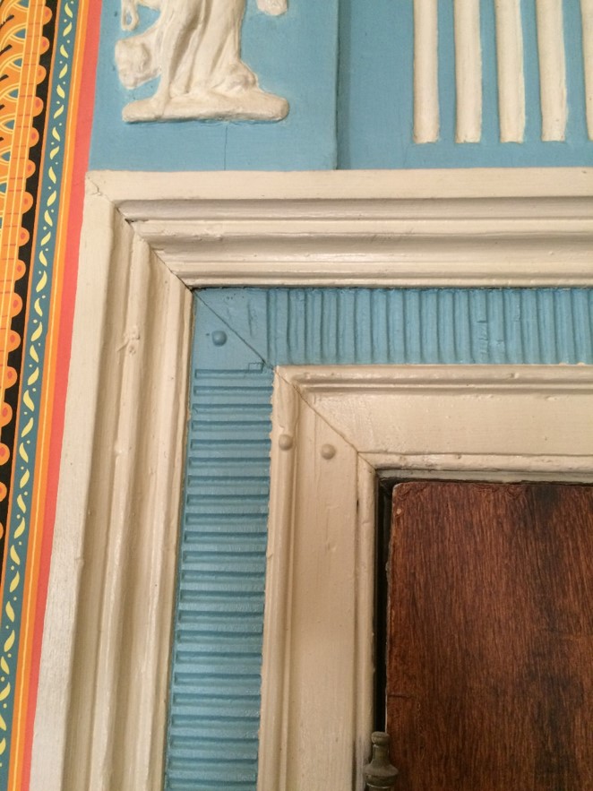 Wood trim painted with bright blue and white.