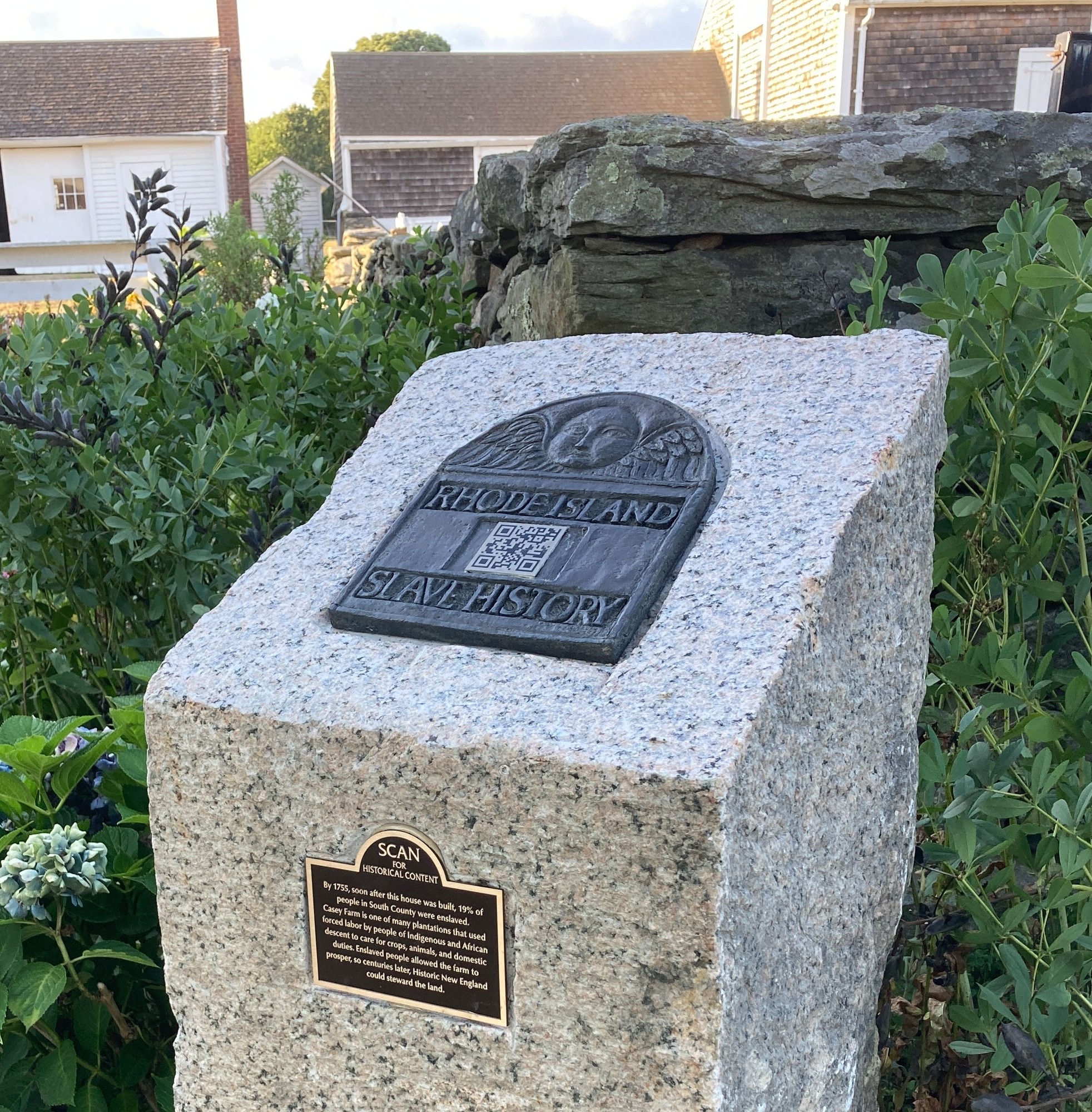 Stone pillar with medallion
