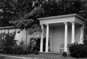 Portico with corinthian columns in a garden