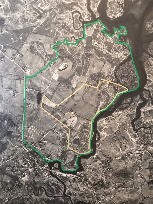 Ariel property view outlined in green, smaller outline in yellow.