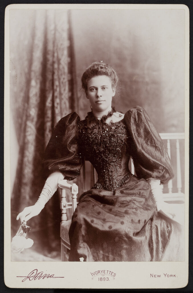 Vintage portrait of a woman in 19th-century attire seated in a chair. Transcribed Text: Ivoryettes 1893. New York.