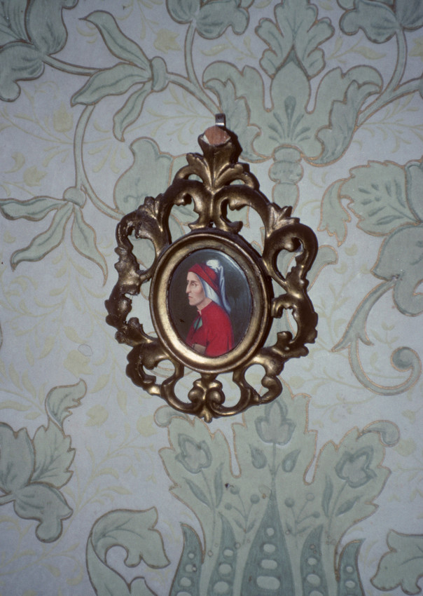 Framed printed portrait; profile of man with red headress; gilt, gesso and wood Baroque frame, elaborate scroll and vegetable molding.