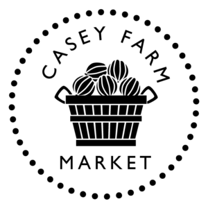 Logo of Casey Farm Market: A basket filled with melons, encircled by the farm's name. Dotted border surrounds the design.