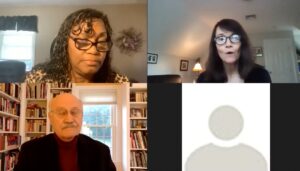 Four people on a video conference call, three in home settings, one with a blank profile image.
