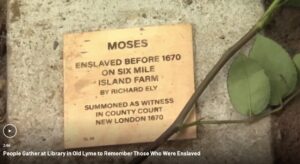 Memorial plaque for Moses, enslaved before 1670, honored in Old Lyme library event to remember the enslaved.
