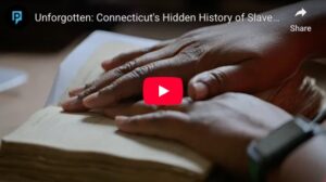 Hands reading an old book, highlighting hidden history in Unforgotten: Connecticut's History of Slavery video.
