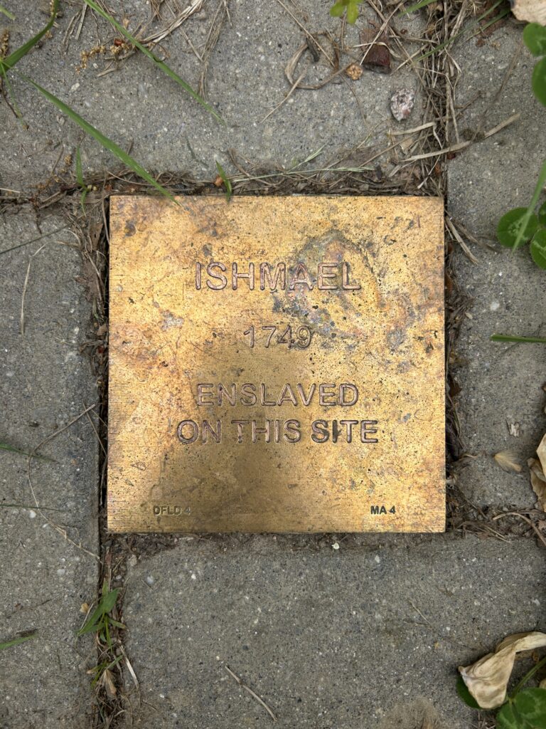 Memorial plaque for Ishmael, 1749, marking site of historical enslavement.