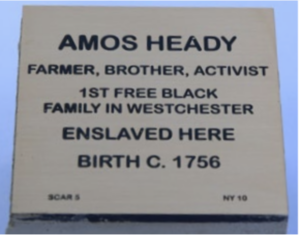 Plaque commemorating Amos Heady, a pioneer of freedom, noted as a farmer and activist in Westchester, born circa 1756.