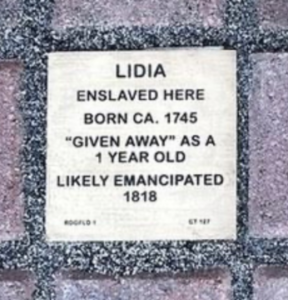Memorial plaque for Lidia, born circa 1745, detailing her enslavement and likely emancipation in 1818.