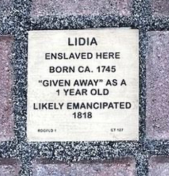 Memorial plaque for Lidia, born circa 1745, detailing her enslavement and likely emancipation in 1818.
