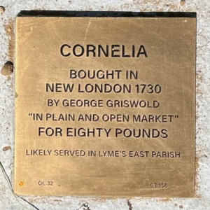 Brass plaque honoring Cornelia, purchased in 1730 in New London by George Griswold for eighty pounds.