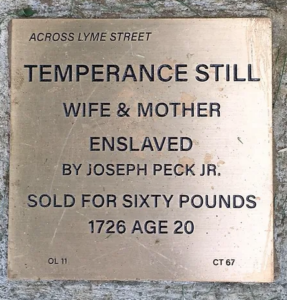 Plaque honoring Temperance Still, enslaved woman sold in 1726, highlighting historical injustices.