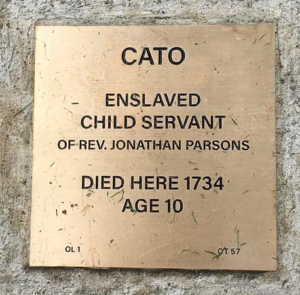 Memorial plaque for Cato, enslaved child servant of Rev. Jonathan Parsons, who died in 1734 at age 10.