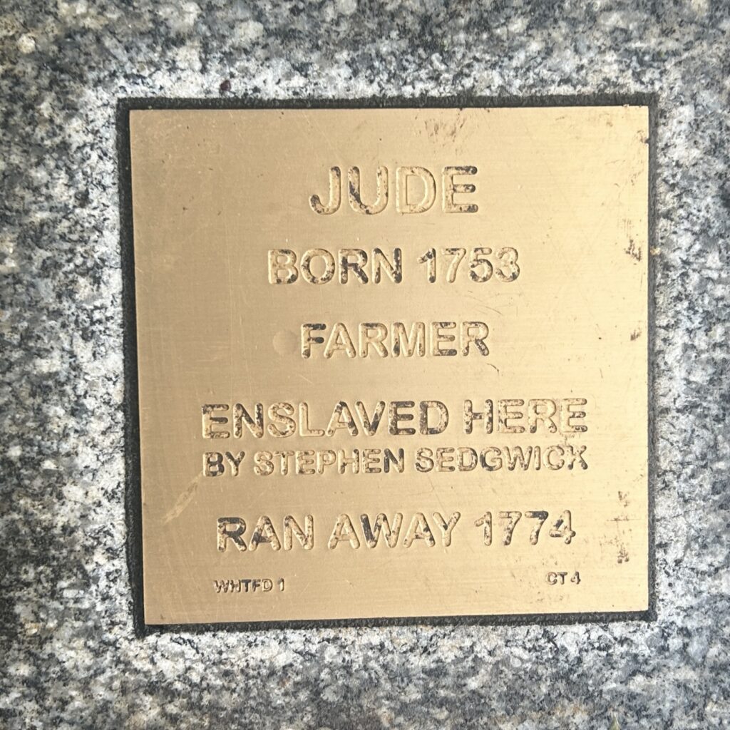Bronze plaque honoring Jude, born 1753, a farmer enslaved by Stephen Sedgwick, who ran away in 1774.