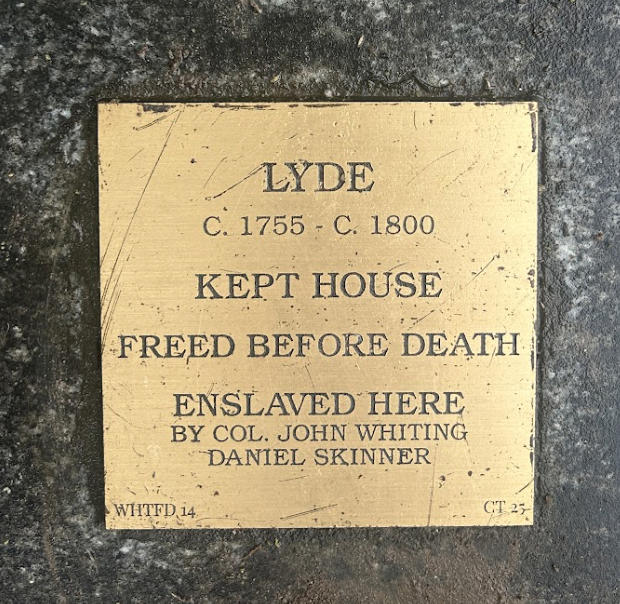 Historic plaque honoring Lyde, enslaved by Col. Whiting and Daniel Skinner, freed before death, c. 1755-1800.