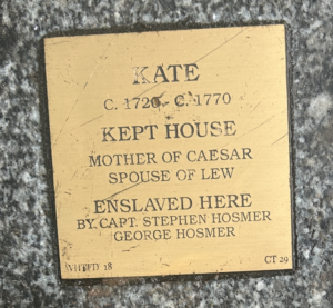 Memorial plaque honoring Kate, c. 1720-1770, kept house, mother of Caesar, enslaved by Stephen and George Hosmer.