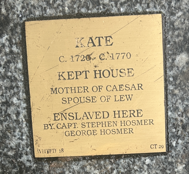 Memorial plaque honoring Kate, c. 1720-1770, kept house, mother of Caesar, enslaved by Stephen and George Hosmer.