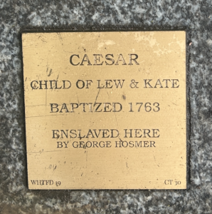 Commemorative plaque for Caesar, child of Lew & Kate, baptized 1763, enslaved by George Hosmer.