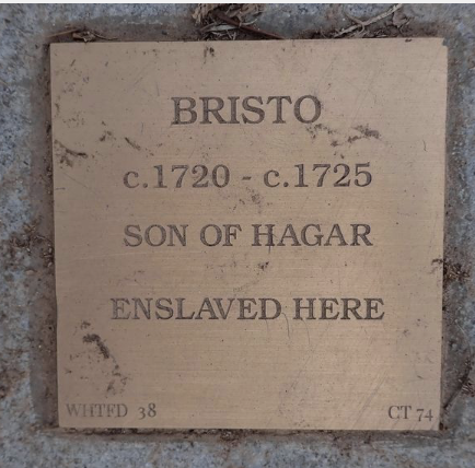 Historic marker for Bristo, son of Hagar, circa 1720-1725, enslaved here; brown plaque on stone surface.