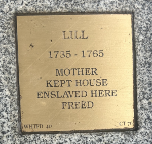 Bronze memorial plaque for Lill (1735-1765), a mother and former enslaved person, commemorating freedom.