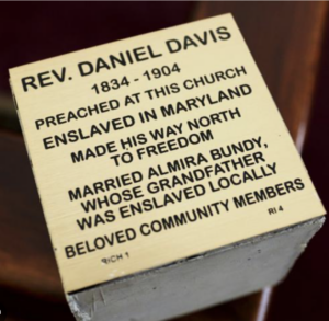 Engraved plaque honoring Rev. Daniel Davis; preacher, former enslaved person, community figure, and freedom seeker.