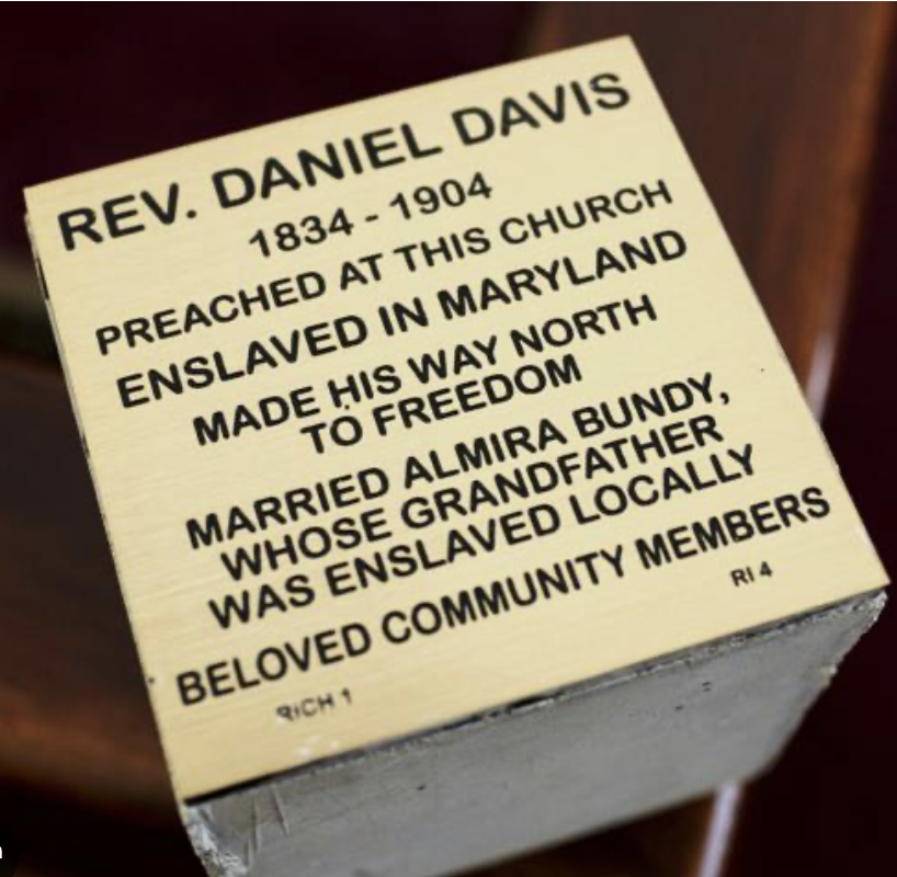Engraved plaque honoring Rev. Daniel Davis; preacher, former enslaved person, community figure, and freedom seeker.