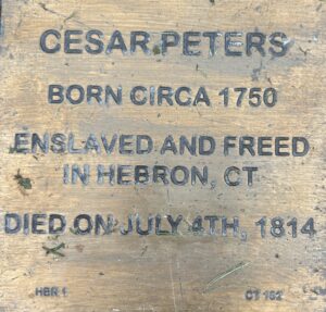 Plaque for Cesar Peters, born circa 1750, enslaved and freed in Hebron, CT, died July 4, 1814.