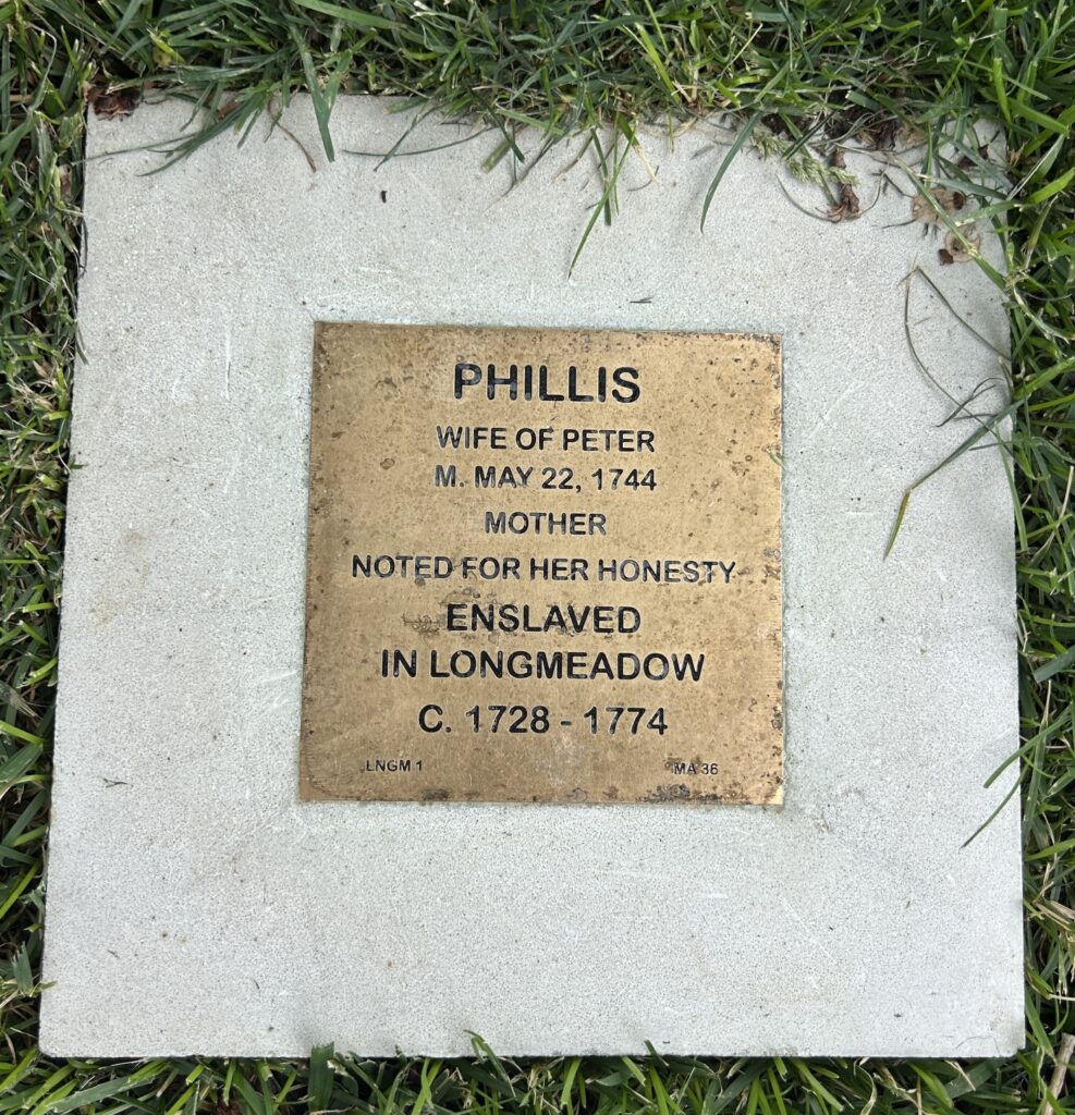 Memorial plaque for Phillis, noting her honesty and enslavement in Longmeadow, circa 1728-1774.