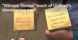 A frame capture from a video of a news story covering the installation of Witness Stones.