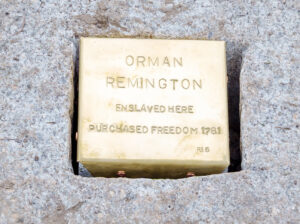 Commemorative plaque for Orman Remington, marking enslavement site and freedom in 1781.