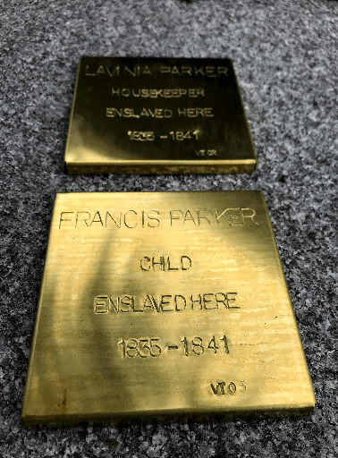 Memorial plaques for Lavinia and Francis Parker, commemorating their enslavement from 1835 to 1841.