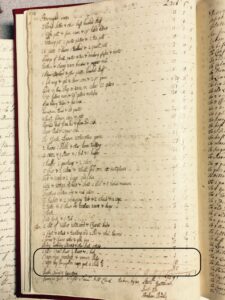 Historical ledger page with handwritten entries detailing various goods and numerical values in a vintage book.