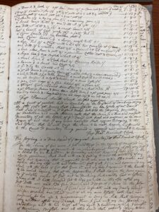 Handwritten financial ledger from 1800s, showcasing detailed transactions in cursive on worn paper.