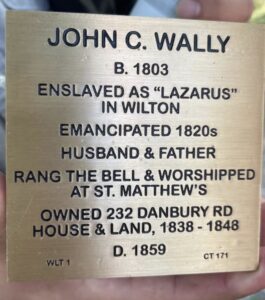 Commemorative plaque for John C. Wally, enslaved in Wilton, emancipated 1820s, worshipped at St. Matthew's, died 1859.