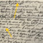 Historical handwritten document with two yellow arrows highlighting specific text sections.