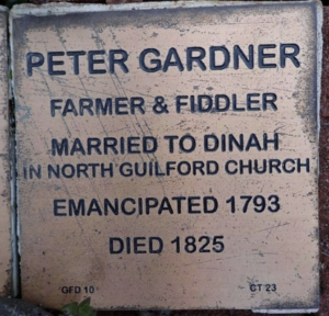Commemorative plaque for Peter Gardner, a farmer and fiddler, married to Dinah, emancipated 1793, died 1825.